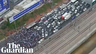 Protesters block Tel Aviv highway and clash with police during anti-reform protest