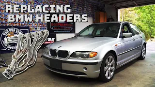 Installing catless headers on our E46 track car. (2002 BMW 325i)