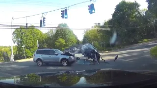 Caught On Camera: Two Cars Collide Head-On At Intersection Sparking Fire