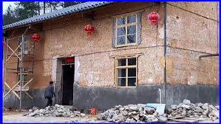 renovating an old house built of soil and large stones