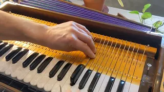 How to resolve a stuck (constantly sounding) note on a harmonium with an octave coupler