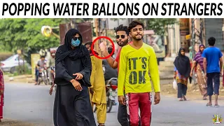 Smashing Water Balloons on Strangers Back Prank - Lahori PrankStar