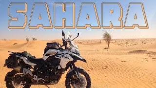 I drop my motorbike and risk getting stuck in the sand of the Sahara desert, Tunisia