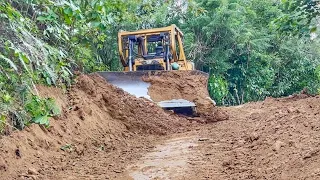 The Toughness and Power of the CAT D6R XL Bulldozer Cutting Cliffs and Widening Mountain Roads