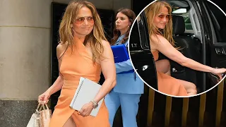 Jennifer Lopez faces wardrobe malfunction as high slit dress flashes undies during NYC meeting