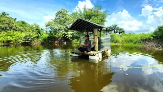 Camping: Making floating raft shelters, from bamboo and plastic, catching rain in the lake and cook