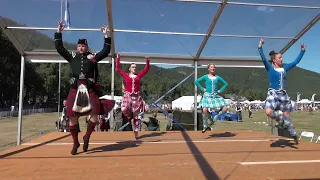 Soldier joins Highland Fling Scottish dance competition during the 2022 Ballater Highland Games