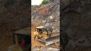 CAT Dozer Cutting Hill Mountain Road Construction