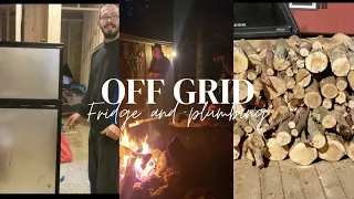 Installing our Off Grid Fridge and Plumbing into Our Off Grid Cabin