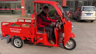 Electric cargo tricycle with roof made by Zongshen Vehicles made in China