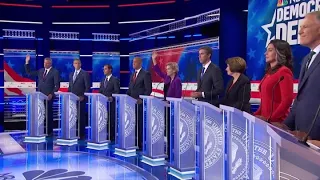 Democrats clash over eliminating private health insurance at first debate