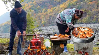 Grandma making Glazed Donuts with Walnuts in the  Forest in Azerbaijan
