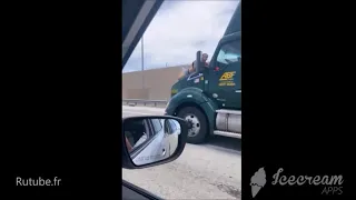 Rutube un homme s’accroche sur le capot d’un camion en marche sur l’autoroute