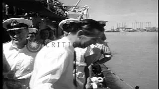 A ferry sails towards a ship and transports people in Iran. HD Stock Footage