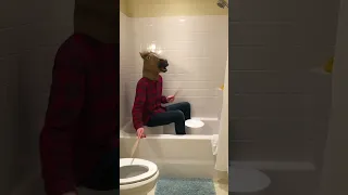 "The Hand That Feeds" played on a bucket by a man-horse in a shower