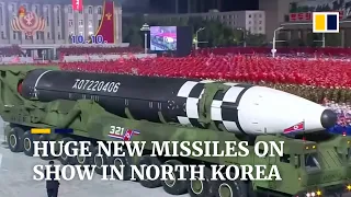 North Korea’s new ‘monster’ intercontinental ballistic missiles on show at military parade