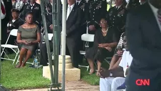 Wife of Sgt. La David Johnson kisses casket