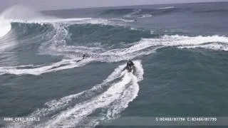 Eaten alive tow in surfing at Jaws and rescue. Heli Shots by Mike Waltze