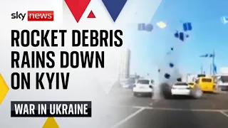 Ukraine War: Dashcam footage shows the moment rocket debris hits a busy road in Kyiv