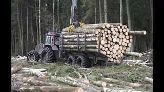 Logging with Valtra A93 forestry tractor, large trailer