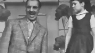 Groucho Marx sings a duet with his daughter Melinda