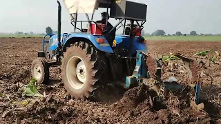 New Holland Excel 5510 with  MB plough on banana field न्यू हॉलैंड 5510 2एमबी रिवर्सिबल plough