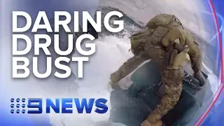 U.S. Coast Guard leaps onto moving submarine filled with cocaine | Nine News Australia