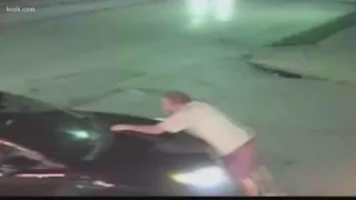 Car thief takes off with man on hood