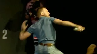 Conor McGregor & Nate Diaz Throw Bottles At Each Other At UFC 202 Press Conference