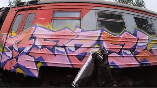 Graffiti bombing on train. Tagging and Throwup. Rebel813 4K 2022