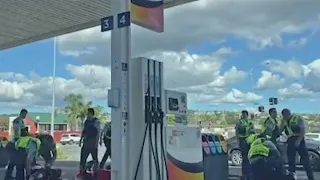 Dramatic footage emerges of police pouncing on bike riders at Auckland petrol station