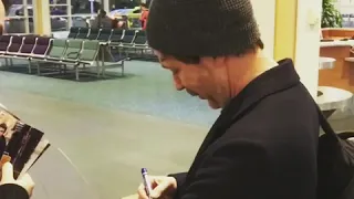 Game of Thrones star Aidan Gillen signing autographs at the Vancouver airport