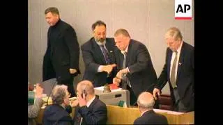 Russia - Zhirinovsky throws water in Duma session