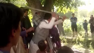 Girl Beaten in Open Court in Sar-e-Pul Province/ مجازات یک دختر در دادگاۀ صحرایی در ولایت‌سرپل