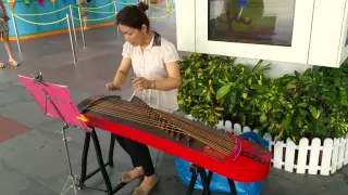 Chinese girl playing her instrument 2015