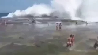 Rogue wave wipes out swimmers in Sydney, Australia .