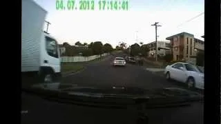 Idiot driver over taking in Brisbane residential street