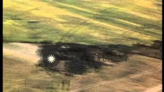 US Army Air Forces fighter strafing Japanese barges near beach in Pacific Theater...HD Stock Footage