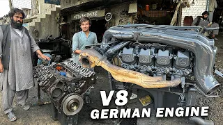 Young Afghan Mechanic demonstrates German V8 engine Assembly with Basic tools