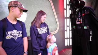 A young jedi meets Darth Vader at Disneyland