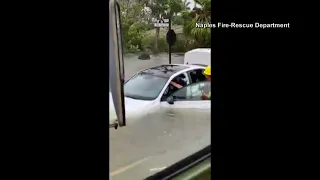 VIDEO | Naples firefighters rescue woman from flooded car during hurricane Ian