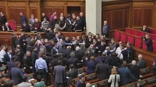 Ukraine protests: Fight breaks out between politicians in parliament