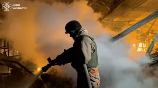 Ukrainian firefighters battle blaze after night missile attack on Odesa | AFP