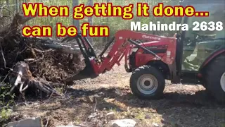 Using the Mahindra 2638 I started clearing an area we want to use for new garden.
