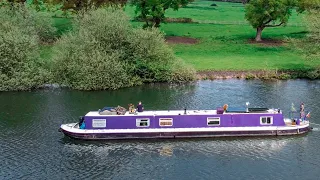 Rainy Narrowboat Journey on a River - Overcoming Increasing Currents and Low Bridges