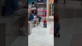 People FREAK OUT seeing chucky doll riding a tricycle