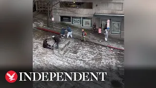 Icy Seattle hill proves comically impossible for pedestrians to walk up