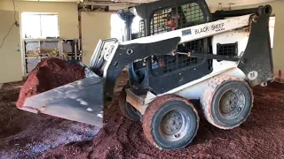 CRAZY BOBCAT SKID-STEER skills INSIDE A HOUSE!