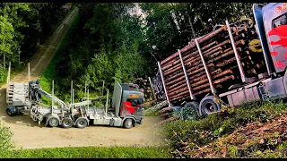 Reversing a trailer and picking up a load of timber