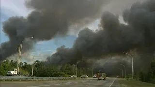 Large brush fire continues burning in west Miami-Dade